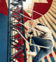 Mr Scales on route to the top of the Circus Big top tent to install the Horizon Radio link transmitter aerial for Soul on a Summers day event of 1984